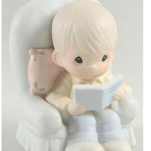 Precious moments figurine : the story of God‘s love